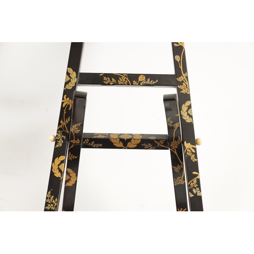 187 - A LATE EDO PERIOD JAPANESE LACQUERED FOLDING MIRROR STAND of easel form with scrolled top and decora... 