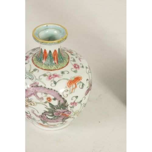 188 - A 19TH CENTURY CHINESE FAMILLE ROSE SHOULDERED VASE the body decorated in coloured enamels with cavo... 