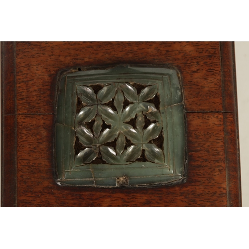 192 - AN EARLY CHINESE JADE PLAQUE MOUNTED ON LATER BOX of square form finely pierced and carved in a leaf... 