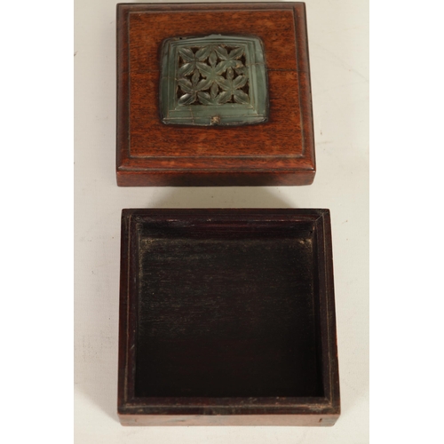 192 - AN EARLY CHINESE JADE PLAQUE MOUNTED ON LATER BOX of square form finely pierced and carved in a leaf... 