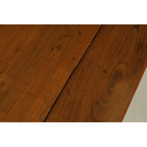 203 - A 20TH CENTURY CHINESE ELM CENTRE TABLE the cleated panelled figured top above a shaped all round cu... 