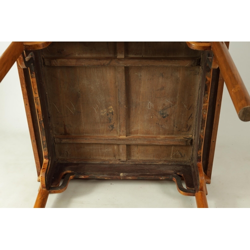 203 - A 20TH CENTURY CHINESE ELM CENTRE TABLE the cleated panelled figured top above a shaped all round cu... 