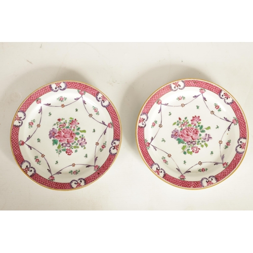 212 - A PAIR OF 18TH/19TH CENTURY CHINESE FAMILLE ROSE PLATES painted in vibrant coloured enamels with flo... 