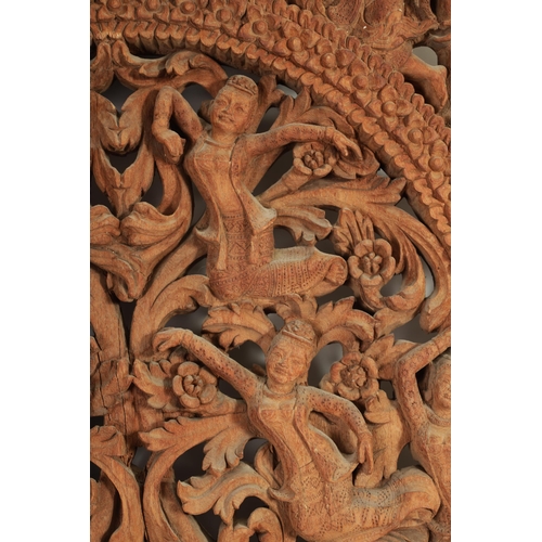 213 - A 19TH CENTURY TIBETAN CARVED HARDWOOD CARVED PANEL / DOOR with figural decoration depicting cats an... 