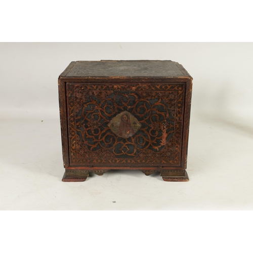 216 - A 17TH CENTURY ANGLO INDIAN TABLE CABINET with scroll and portrait decorated painted body; the hinge... 