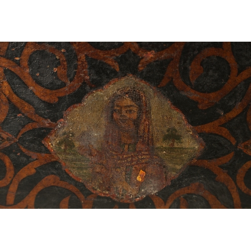 216 - A 17TH CENTURY ANGLO INDIAN TABLE CABINET with scroll and portrait decorated painted body; the hinge... 