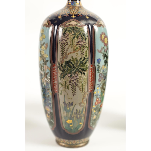 218 - A FINE PAIR OF JAPANESE MEIJI PERIOD CLOISONNÉ VASES of slender shaped tapering form fully decorated... 