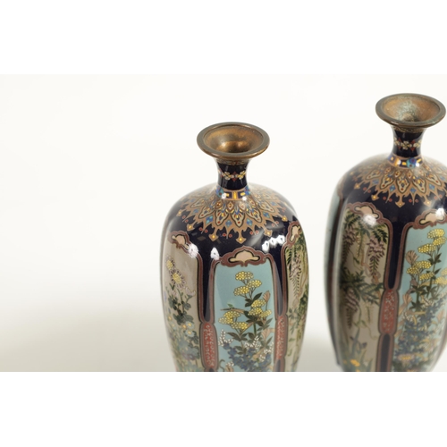 218 - A FINE PAIR OF JAPANESE MEIJI PERIOD CLOISONNÉ VASES of slender shaped tapering form fully decorated... 