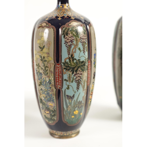 218 - A FINE PAIR OF JAPANESE MEIJI PERIOD CLOISONNÉ VASES of slender shaped tapering form fully decorated... 