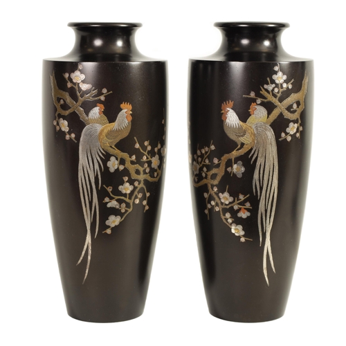 225 - A PAIR OF JAPANESE MEIJI PERIOD PATINATED BRONZE AND MIXED METAL VASES each decorated with inlaid go... 