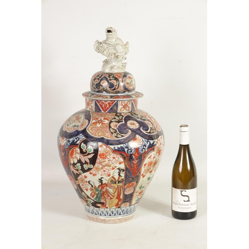 226 - A 19TH CENTURY JAPANESE LARGE INVERTED BALUSTER VASE AND COVER with colourful panelled floral and fl... 