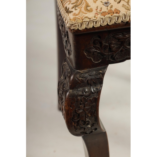 227 - A LATE 19TH CENTURY CHINESE HARDWOOD SINGLE CHAIR with fan shaped and pierced work back above an uph... 