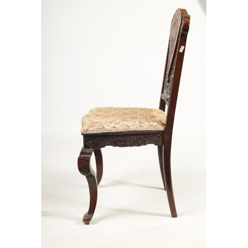 227 - A LATE 19TH CENTURY CHINESE HARDWOOD SINGLE CHAIR with fan shaped and pierced work back above an uph... 