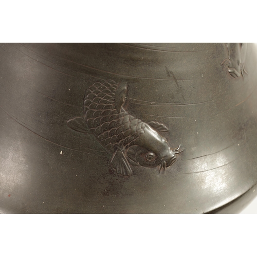 228 - A LARGE JAPANESE MEIJI PERIOD BRONZE VASE DECORATED WITH CARP of flared tapering shape with swimming... 