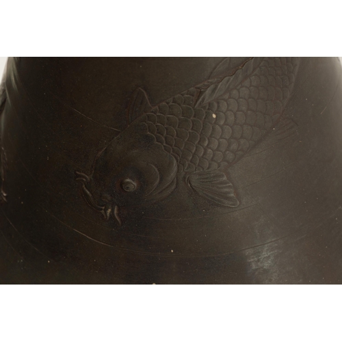 228 - A LARGE JAPANESE MEIJI PERIOD BRONZE VASE DECORATED WITH CARP of flared tapering shape with swimming... 