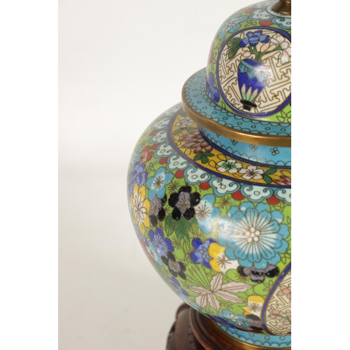 234 - A LATE 19TH CENTURY CHINESE CLOISONNÉ ENAMEL JAR AND COVER ON CARVED WOOD STAND of tapering shoulder... 