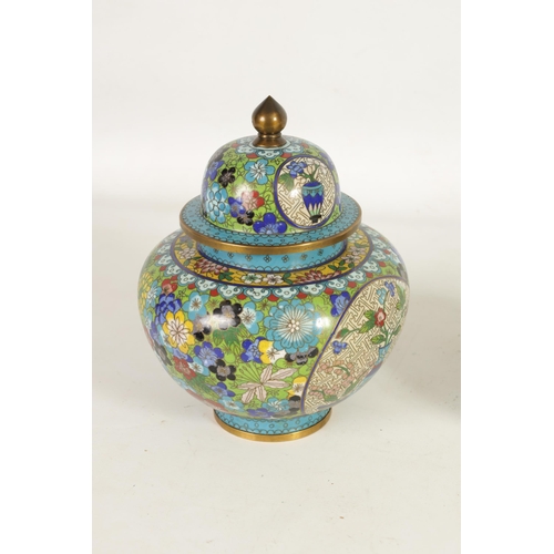 234 - A LATE 19TH CENTURY CHINESE CLOISONNÉ ENAMEL JAR AND COVER ON CARVED WOOD STAND of tapering shoulder... 