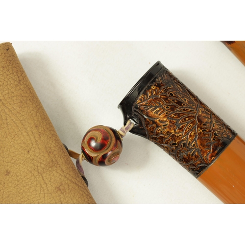 236 - A MEIJI PERIOD JAPANESE PIPE CASE AND TOBACCO POUCH the bamboo case with floral lacquer work band wi... 