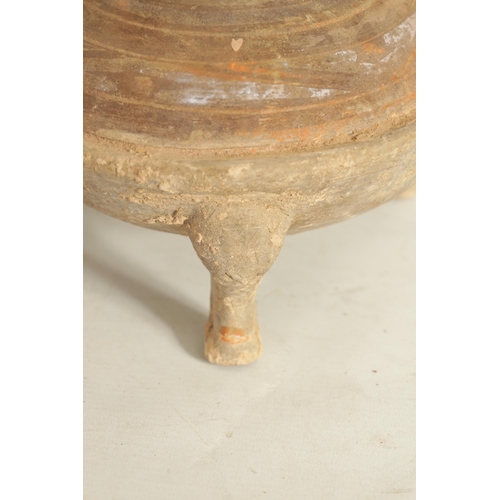 238 - A CHINESE HAN PERIOD THREE LEGGED POT with domed top raised on three cabriolet legs (13.5cm high, 22... 