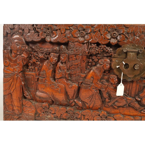 239 - AN EARLY 20TH CENTURY CHINESE CARVED HARDWOOD BLANKET BOX with carved figural landscape panels to th... 