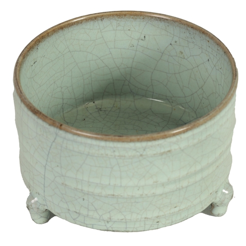 242 - AN EARLY CHINESE RU WARE CENSER the celadon glaze ribbed cylindrical crackle glaze body raised on th... 