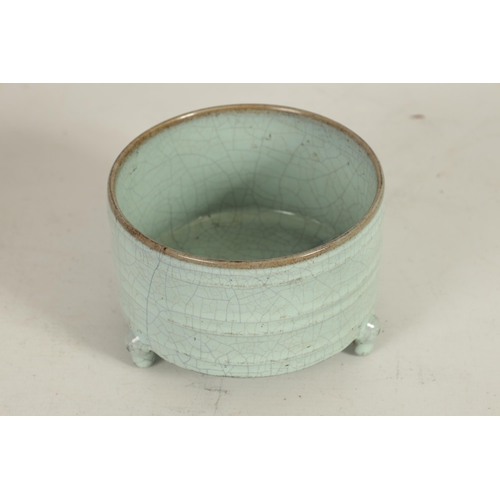 242 - AN EARLY CHINESE RU WARE CENSER the celadon glaze ribbed cylindrical crackle glaze body raised on th... 