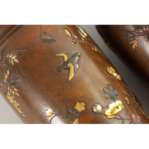 246 - A GOOD PAIR OF JAPANESE MEIJI PERIOD MIXED METAL AND BRONZE CABINET VASES highly decorated with flow... 