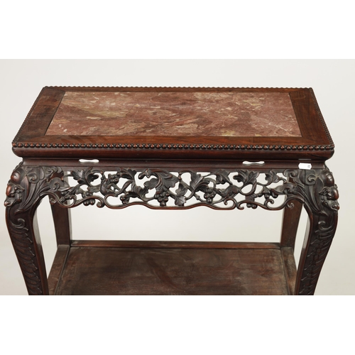 251 - A 19TH CENTURY CHINESE HARDWOOD ALTAR TABLE with inset marble top above a finely carved pierced frie... 