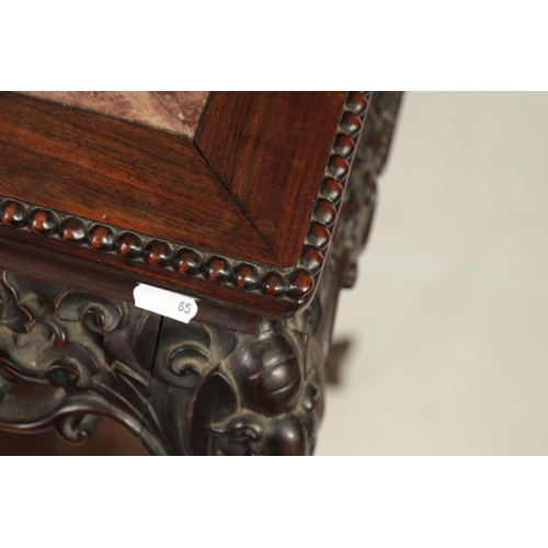 251 - A 19TH CENTURY CHINESE HARDWOOD ALTAR TABLE with inset marble top above a finely carved pierced frie... 