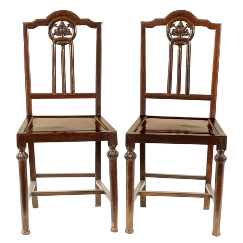 252 - A GOOD PAIR OF 19TH CENTURY CHINESE HARDWOOD SIDE CHAIRS with shaped top rails enclosing carved leaf... 