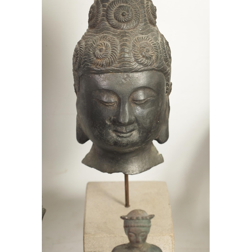 254 - A COLLECTION OF 19TH / 20TH CENTURY BRONZE AND CERAMIC BUDDHAS including a corpus cristi, a stone ra... 