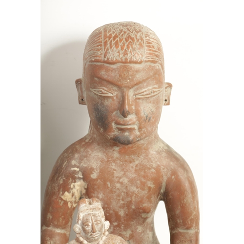 254 - A COLLECTION OF 19TH / 20TH CENTURY BRONZE AND CERAMIC BUDDHAS including a corpus cristi, a stone ra... 