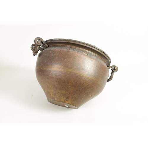 256 - A 19TH CENTURY ORIENTAL COPPER JARDINIERE With hammered body and loop handles