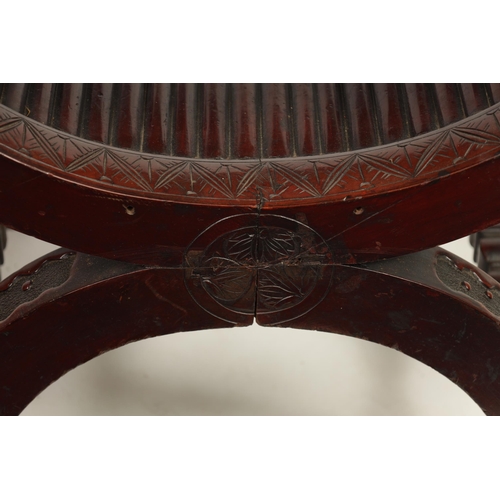 257 - AN IMPRESSIVE LATE 19TH CENTURY CHINESE HARDWOOD X FRAME THRONE CHAIR profusely carved with a panell... 