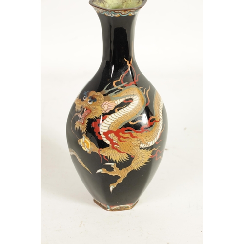 262 - AN EARLY 20TH CENTURY CHINESE CLOISONNÉ ENAMEL VASE of panelled slender ovoid form decorated with a ... 