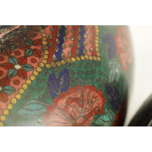 272 - AN OVERSIZED 19TH CENTURY CHINESE CLOISONNE KORO raised on three bulbous legs fitted a domed cover w... 