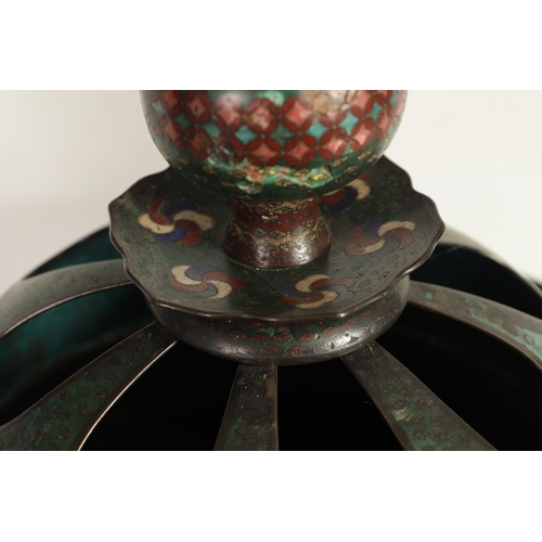 272 - AN OVERSIZED 19TH CENTURY CHINESE CLOISONNE KORO raised on three bulbous legs fitted a domed cover w... 