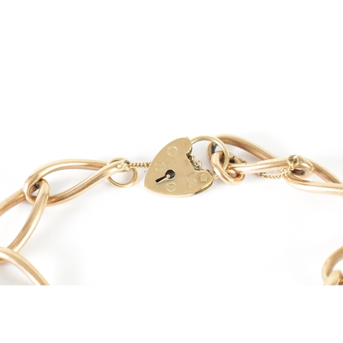 273 - A 9CT ROSE GOLD LOCKET BRACELET with twisted curb links and heart-shaped padlock clasp with safety c... 