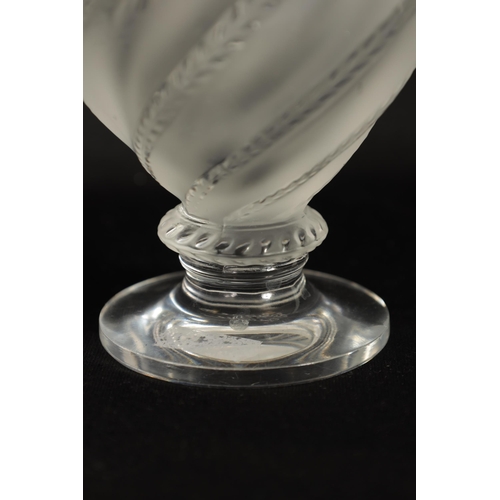 28 - A PAIR OF LALIQUE FROSTED AND CLEAR GLASS “ERMENONVILLE” VASES of twisted design on circular feet, e... 