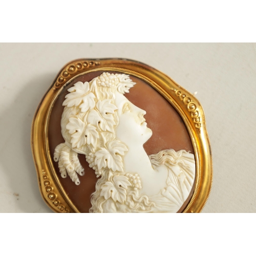 282 - A FINE 19TH CENTURY CARVED CAMEO BUST PORTRAIT BROOCH depicting the head and shoulders of a young la... 