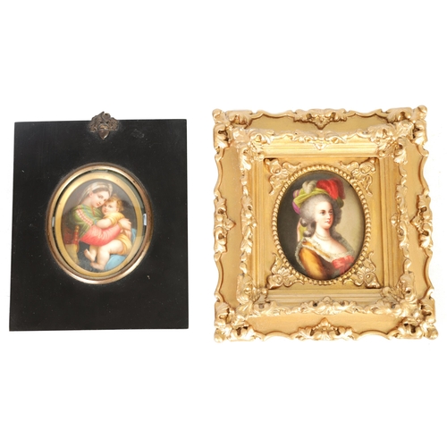 29 - TWO 19TH CENTURY CONTINENTAL OVAL PORCELAIN PLAQUES painted with female bust portraits, one holding ... 