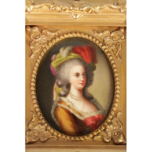 29 - TWO 19TH CENTURY CONTINENTAL OVAL PORCELAIN PLAQUES painted with female bust portraits, one holding ... 