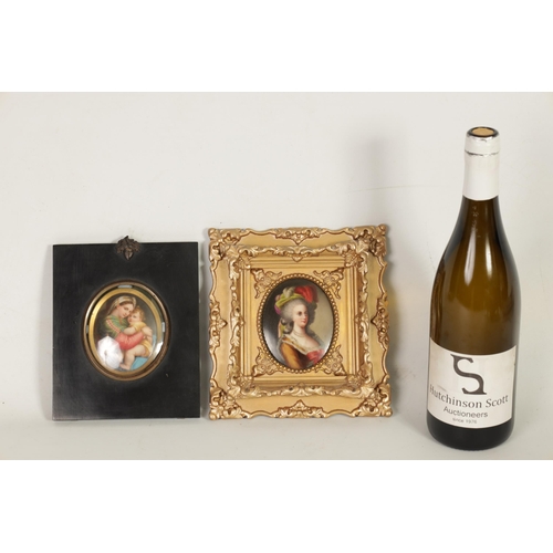 29 - TWO 19TH CENTURY CONTINENTAL OVAL PORCELAIN PLAQUES painted with female bust portraits, one holding ... 