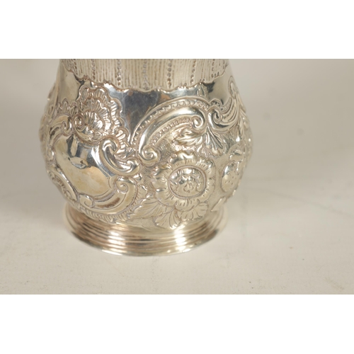 301 - A GEORGE IV SILVER MUSTARD POT AND LINER OF LARGE SIZE of lidded baluster form with embossed scroll ... 