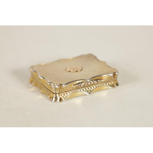 302 - AN EARLY VICTORIAN SILVER GILT VINAIGRETTE BY NATHANIEL MILLS of shaped rectangular form with engine... 