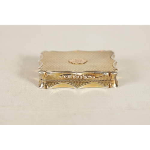 302 - AN EARLY VICTORIAN SILVER GILT VINAIGRETTE BY NATHANIEL MILLS of shaped rectangular form with engine... 