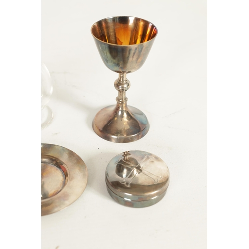 308 - A CASED SILVER COMMUNION SET Consisting of a chalice, paten, a pyx box with gilt interior and a deca... 