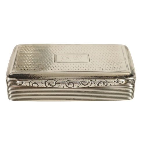 310 - A MID 19TH CENTURY SILVER AND SILVER GILT SNUFF BOX of rectangular form with reeded body and engine-... 