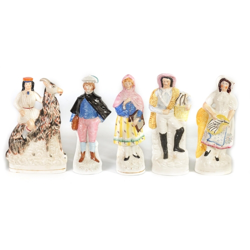 33 - A GROUP OF 19TH CENTURY STAFFORDSHIRE FIGURES comprising two pairs along with a seated goat and ride... 