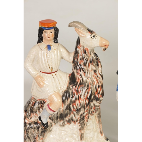 33 - A GROUP OF 19TH CENTURY STAFFORDSHIRE FIGURES comprising two pairs along with a seated goat and ride... 